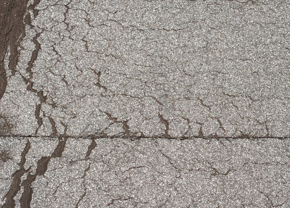 Losliggend dakleer op plat dak in Landsmeer